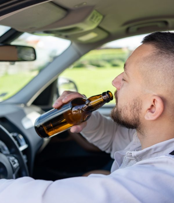 Man,Drinking,Alcohol,While,Driving,A,Car.,Don't,Drink,And